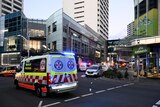 nsw ambulances and police outside the westfield shopping centre at bondi junction after a mass stabbing event