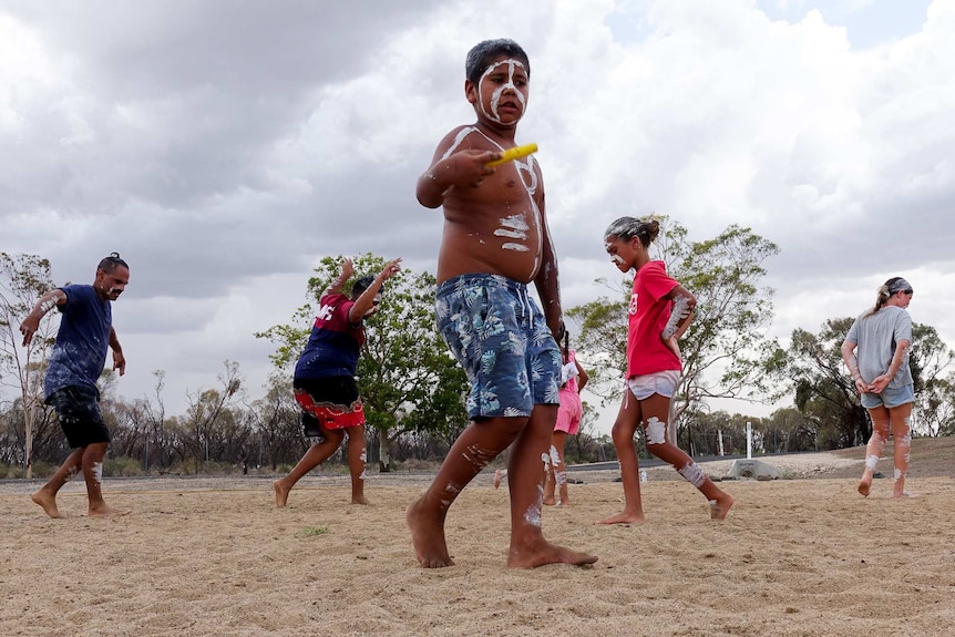 Children learn traditional dance.