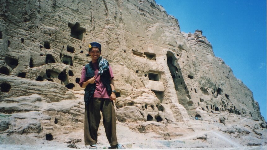Agustinus in front of Bamiyan complex in Afghanistan