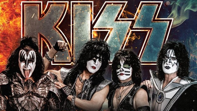 four band members in black and white facepaint in front of the word 'Kiss'