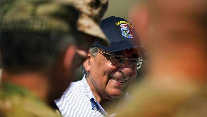 US defence secretary Leon Panetta smiles upon his arrival at Kabul International Airport on June 7, 2012.