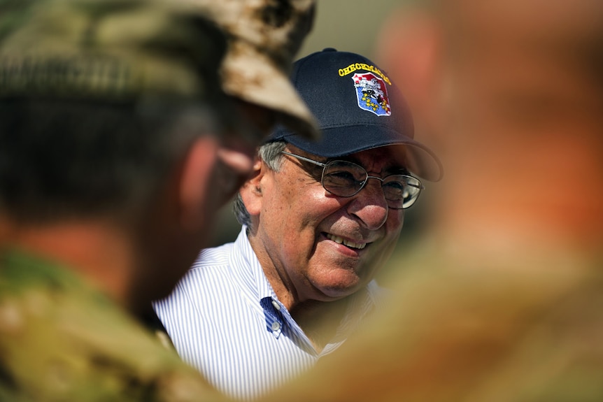 US defence secretary Leon Panetta smiles upon his arrival at Kabul International Airport on June 7, 2012.