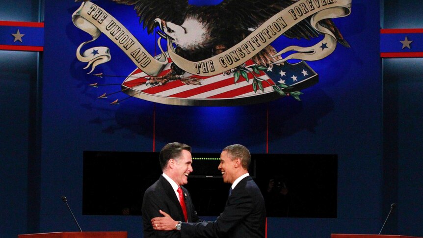 LtoR Mitt Romney and Barack Obama shake hands before the first presidential debate.