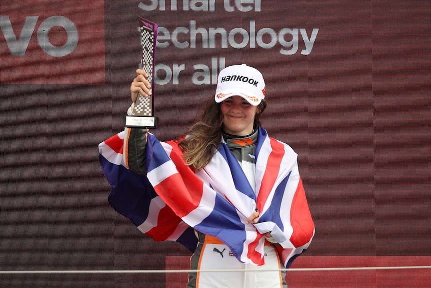 Abbi Pulling celebrates third place at the W Series event at Silverstone, 2022