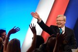 Kevin Rudd waves to a cheering crowd during the Australian Labor Party's election campaign launch