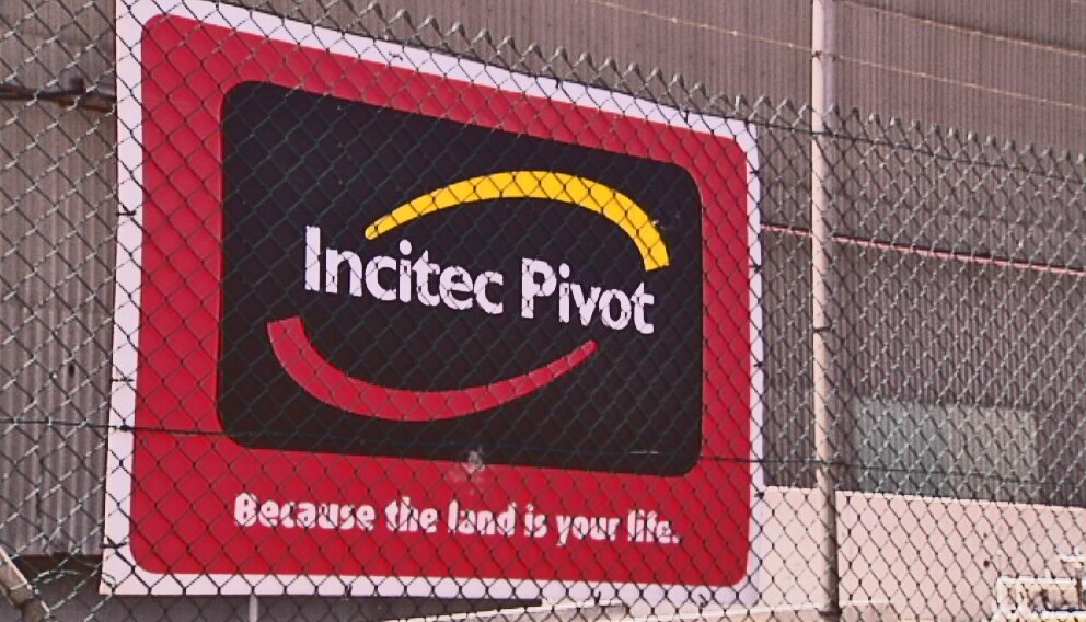 Red Incitec Pivot sign and logo at fertiliser plant at Port Adelaide.