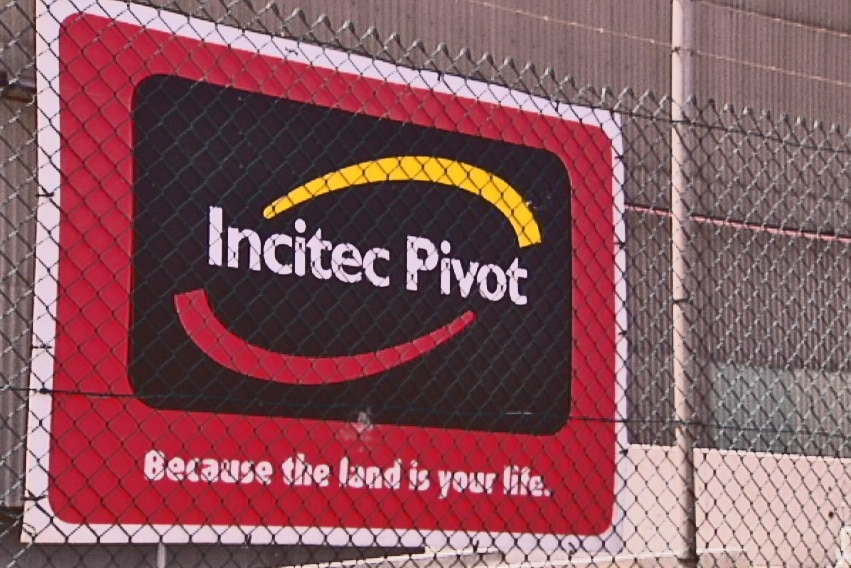 Red Incitec Pivot sign and logo at fertiliser plant at Port Adelaide.