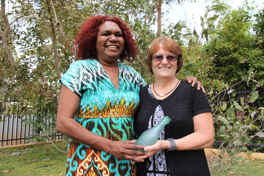 The two women laugh together when they have their photo taken in Broome.