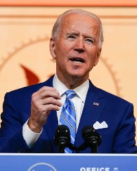 Joe Biden speaks at a lectern