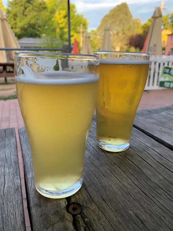 Photo of two beers on a table.