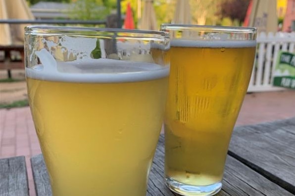 Photo of two beers on a table.