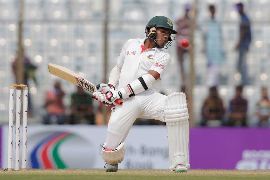 Mehedi Hasan tries to get under a ball