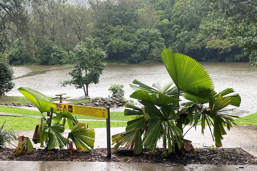 Crocodile warning sign at Lake Placid near Cairns in Far North Queensland.