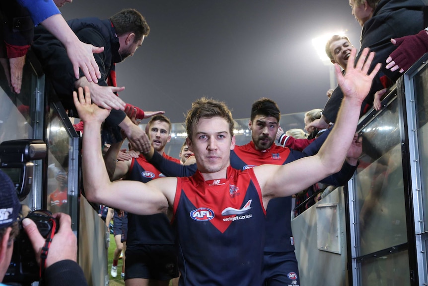 Melbourne's Jack Trengove greets fans after the Demons' win over the Western Bulldogs.