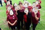 School support workers wearing Emperor Barnett masks