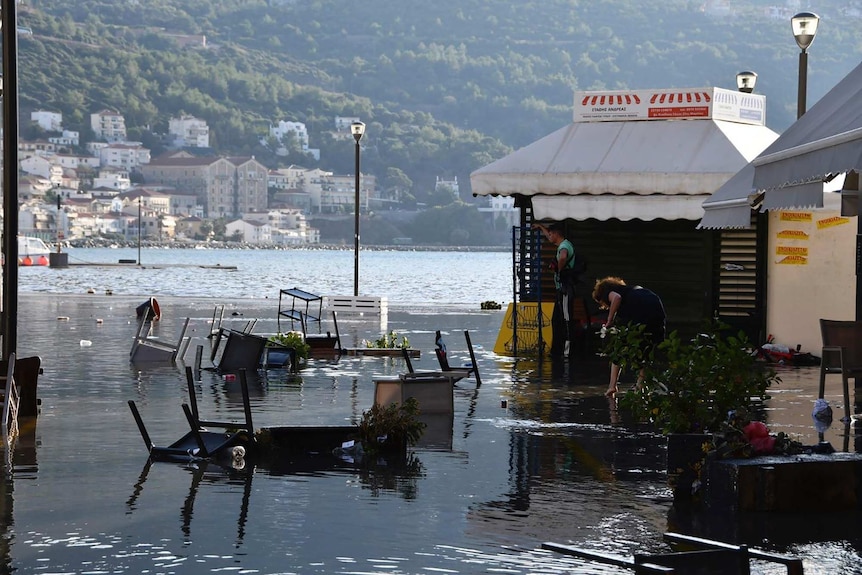 Seawater covers a square after an earthquake at the port of Vathi on the eastern Aegean island of Samos.