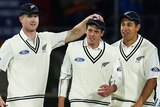 Mitchell Santner is congratulated after catching out Ashton Agar