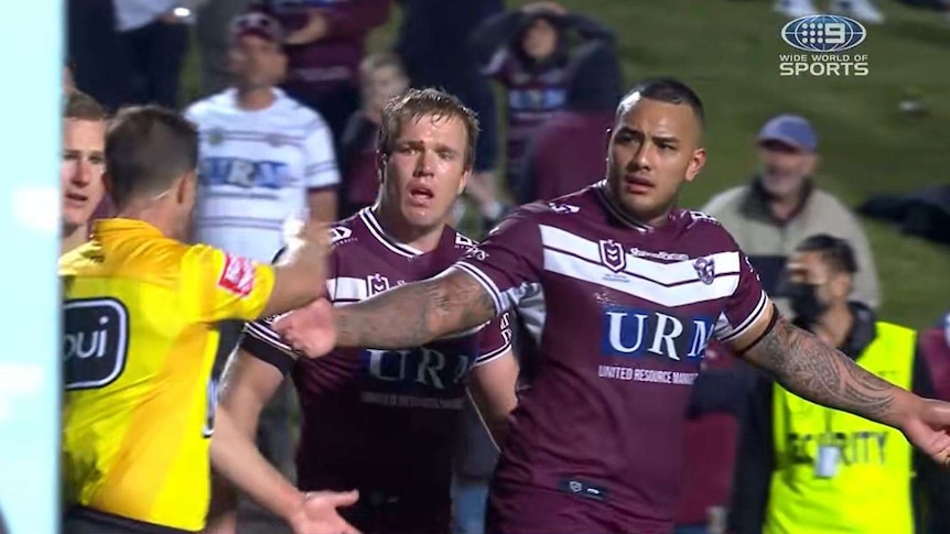 Addin Fonua-Blake, Jake Trbojevic and Daly Cherry-Evans speak to the referee at the end of an NRL game.