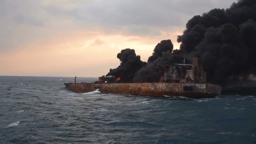 Firefighters struggle to put out fire at stricken oil tanker.