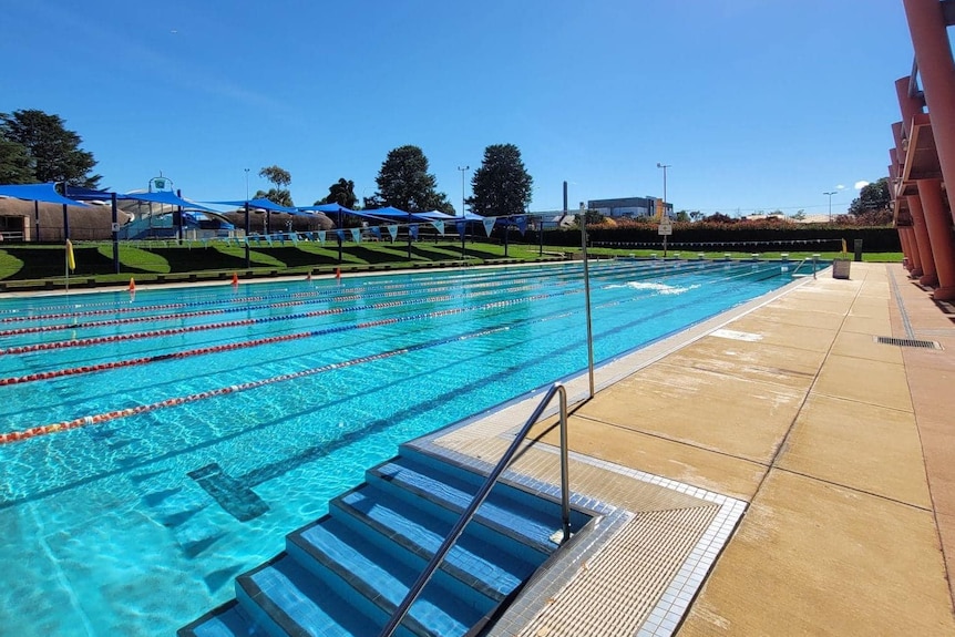 Queanbeyan pool glistens in the sunlight.
