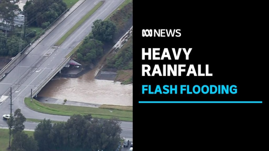 Heavy Rainfall, Flash Flooding: Aerial vision of flooding underneath a causeway.
