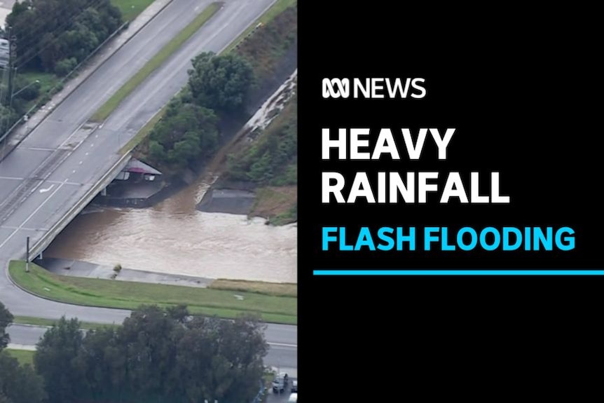 Heavy Rainfall, Flash Flooding: Aerial vision of flooding underneath a causeway.