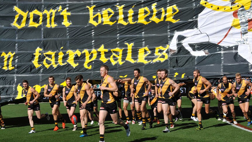 Richmond players run on to Adelaide Oval ahead of an elimination final against Port Adelaide