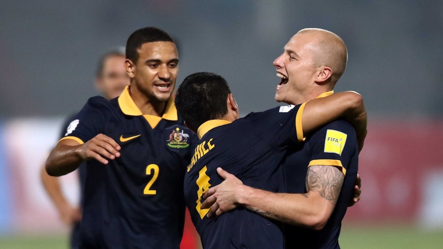 Socceroos celebrate 4-0 defeat over Bangladesh during FIFA World Cup qualification match