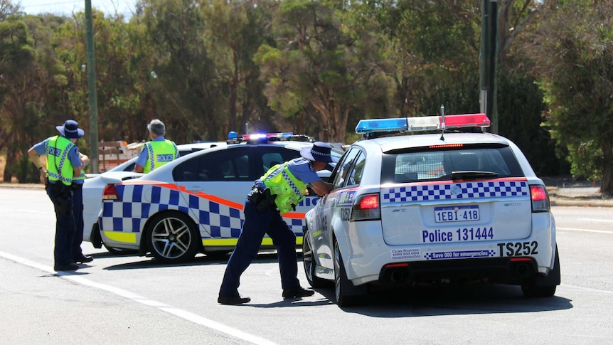 A road has been closed in Geraldton after a car containing chemicals was stopped.