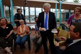 Prime Minister Kevin Rudd serves coffee to aged care workers at St Laurence's Hostel in Adelaide.