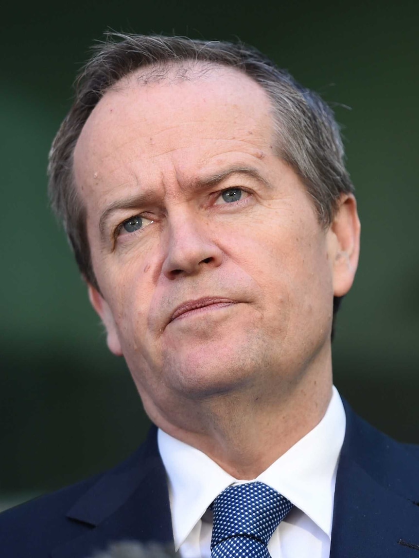 Bill Shorten listens to a question