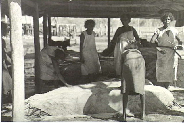 A historical photo of Aboriginal women working at the butchery during World War II in Koolpinyal, NT.