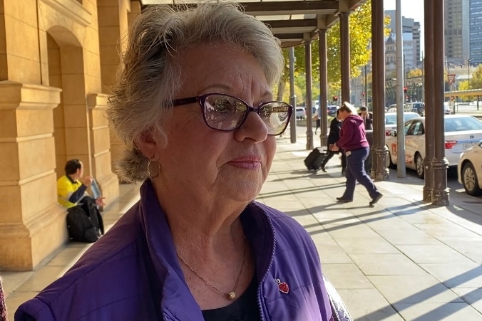 Anne Margrie standing on the footpath outside court in Adelaide