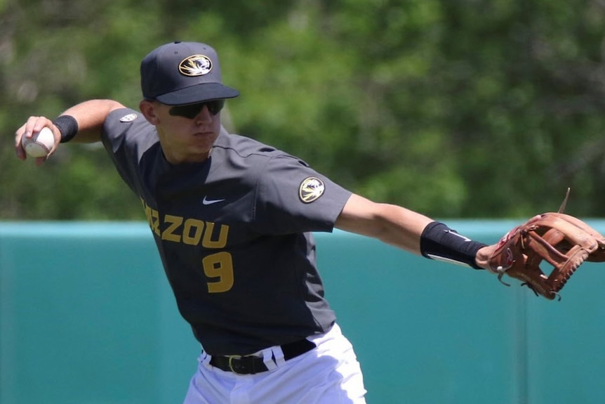 University of Missouri baseball player Robbie Glendinning prepares to throw a ball.