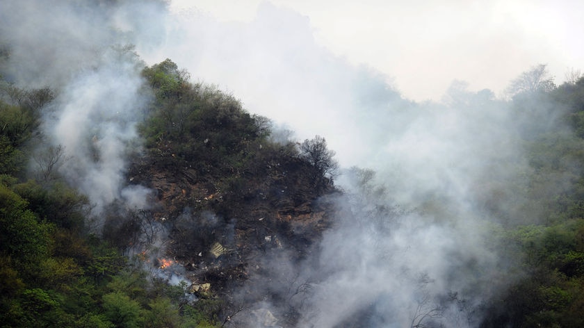 Smoke, flames rise from Pakistan plane crash site