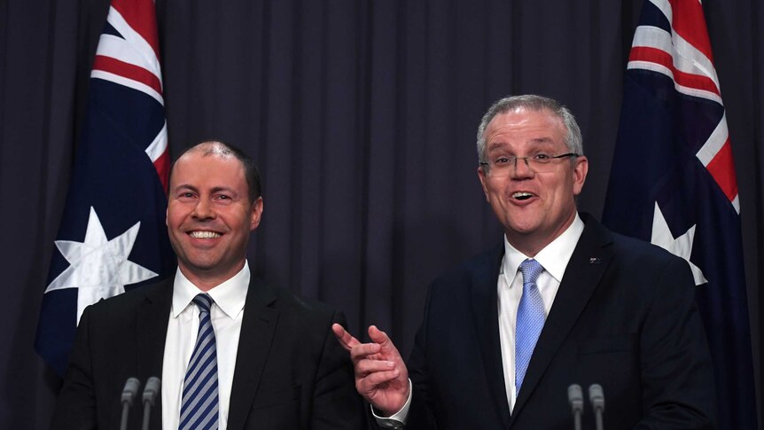 Josh Frydenberg and Scott Morrison share a joke