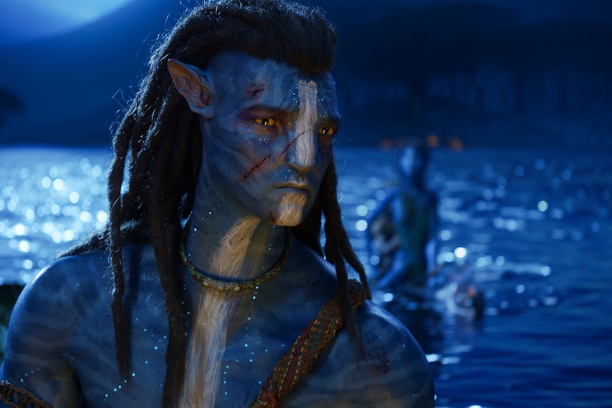 worthington as jake sully, close up of blue man with dreadlocks