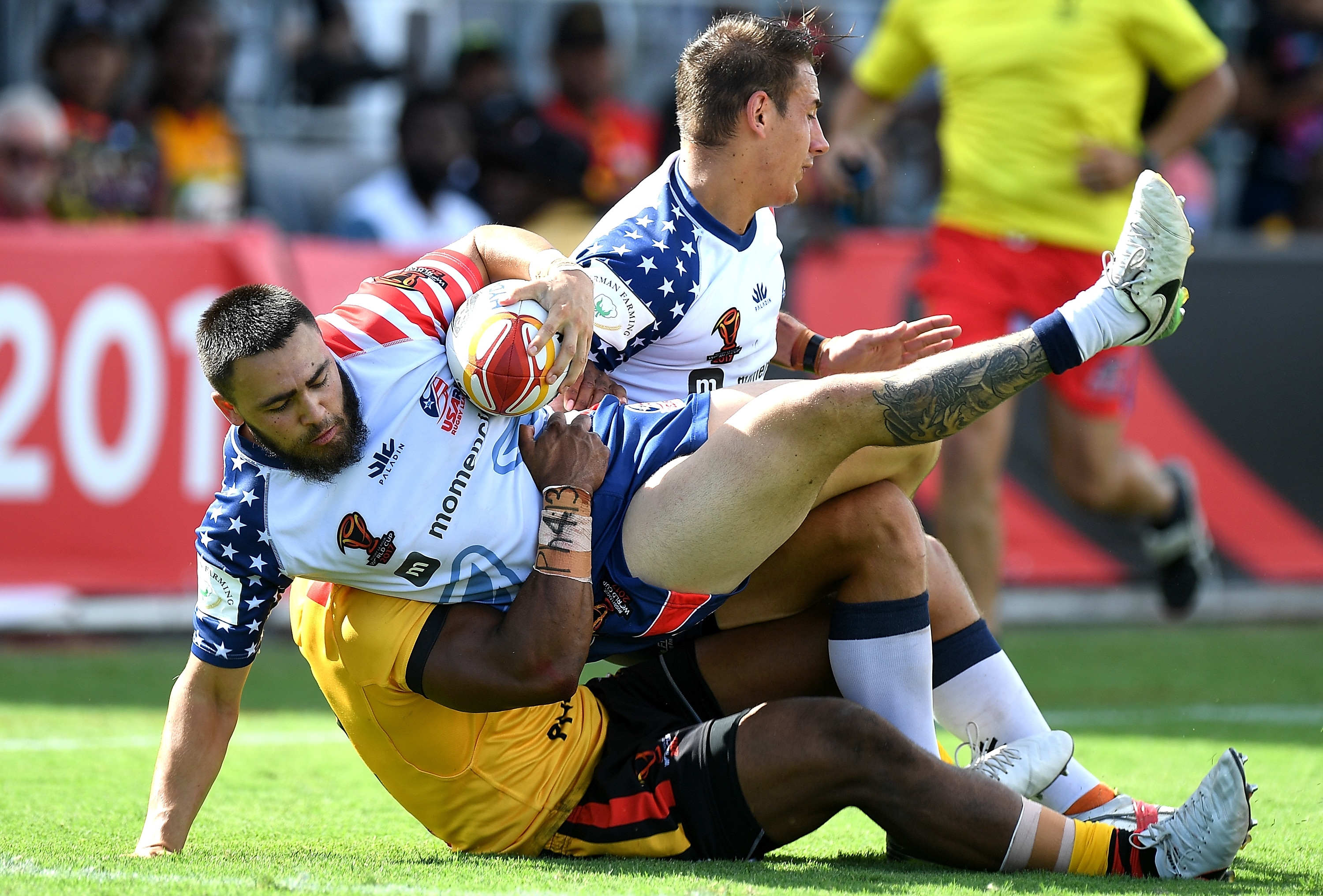 A man is tackled during a rugby league match