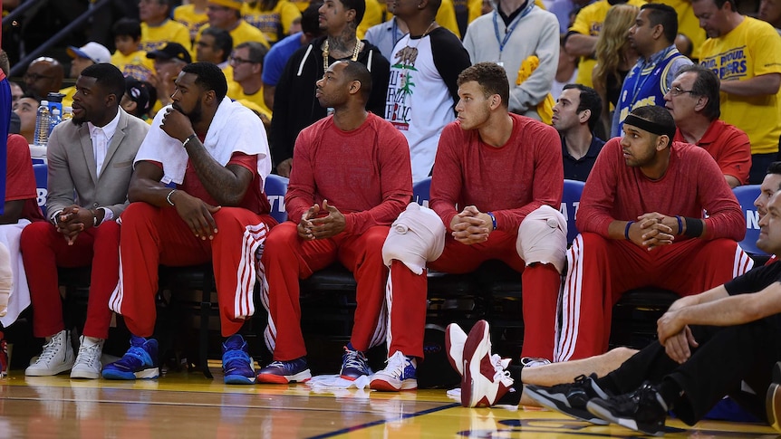 LA Clippers wear their warm-up tops inside out to protest racist remarks attributed to team owner.