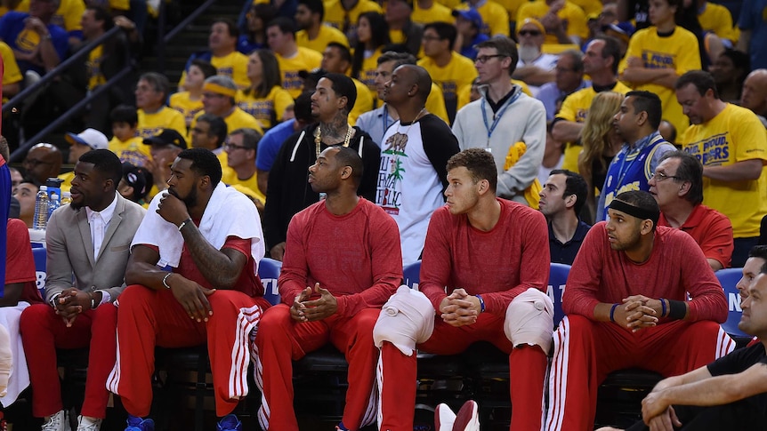 Los Angeles Clippers players wear their tops inside out to hide the team logo in protest at owner Do