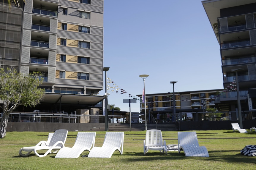 A group of empty sun lounges in a deserted section of the Darwin waterfront.