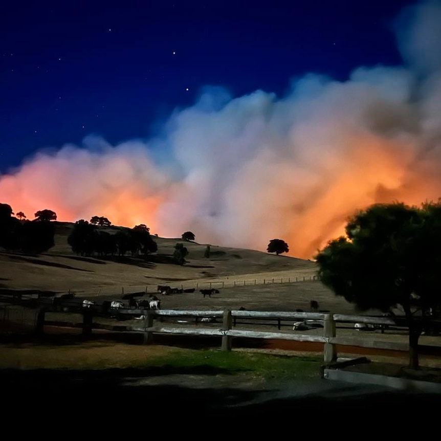 View of smoke and flames from the bushfire still burning in WA.