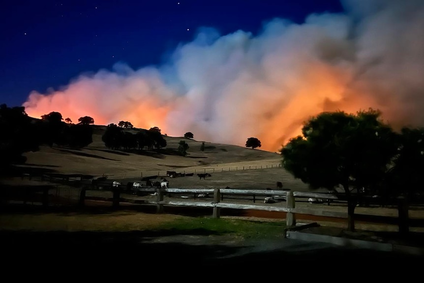 View of smoke and flames from the bushfire still burning in WA.