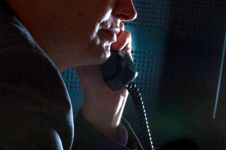 Anonymous businessman talking on the phone