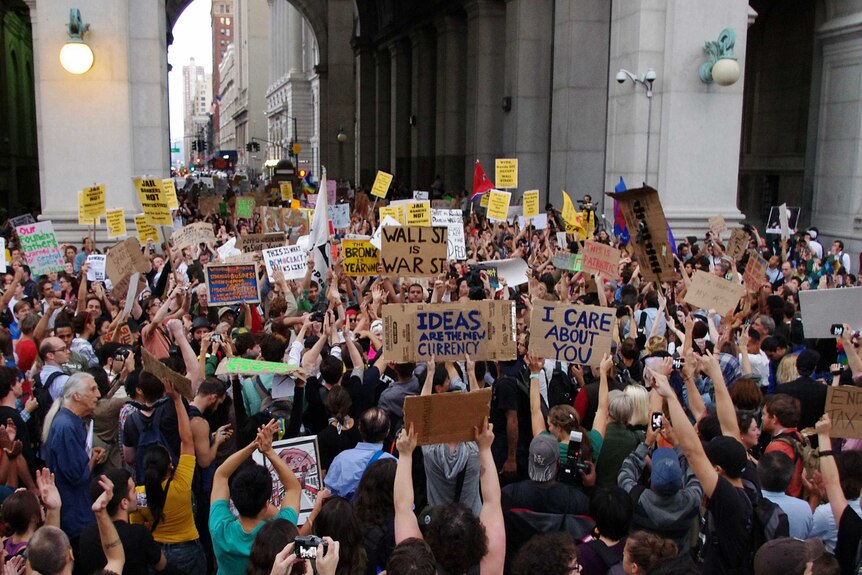 Occupy Wall Street supporters march to police headquarters as a protest against police brutality.