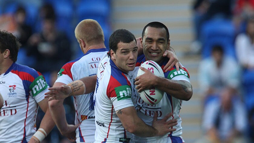 Sting in the tail: Jarrod Mullen and Zeb Taia celebrate during the Knights' second straight win.