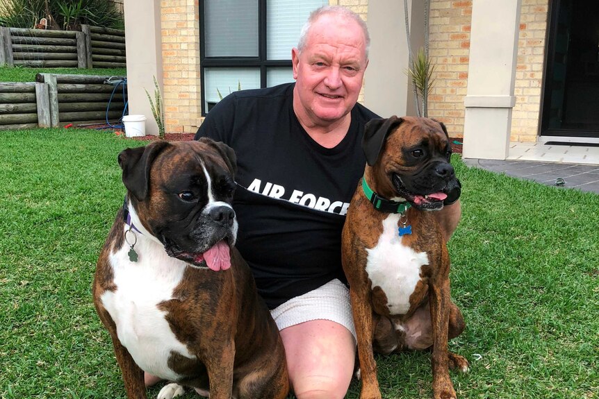 Graham Nickisson and his dogs.