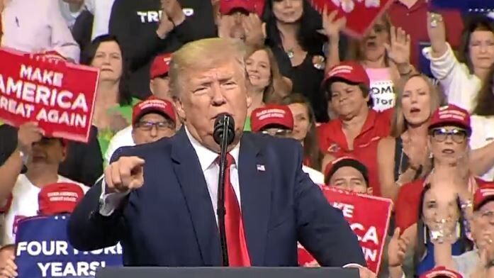Screen shot of Donald Trump speaking in front 's 2020 campaign launch in front of crowds in Florida