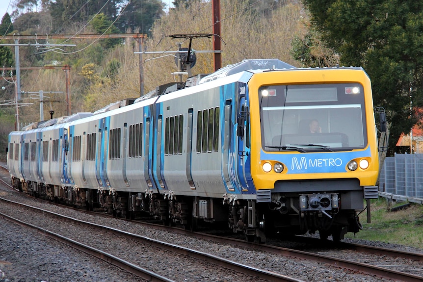 A Metro train in outer Melbourne