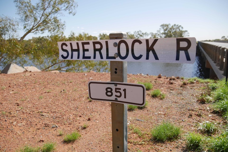 Sherlock River sign next to a bridge